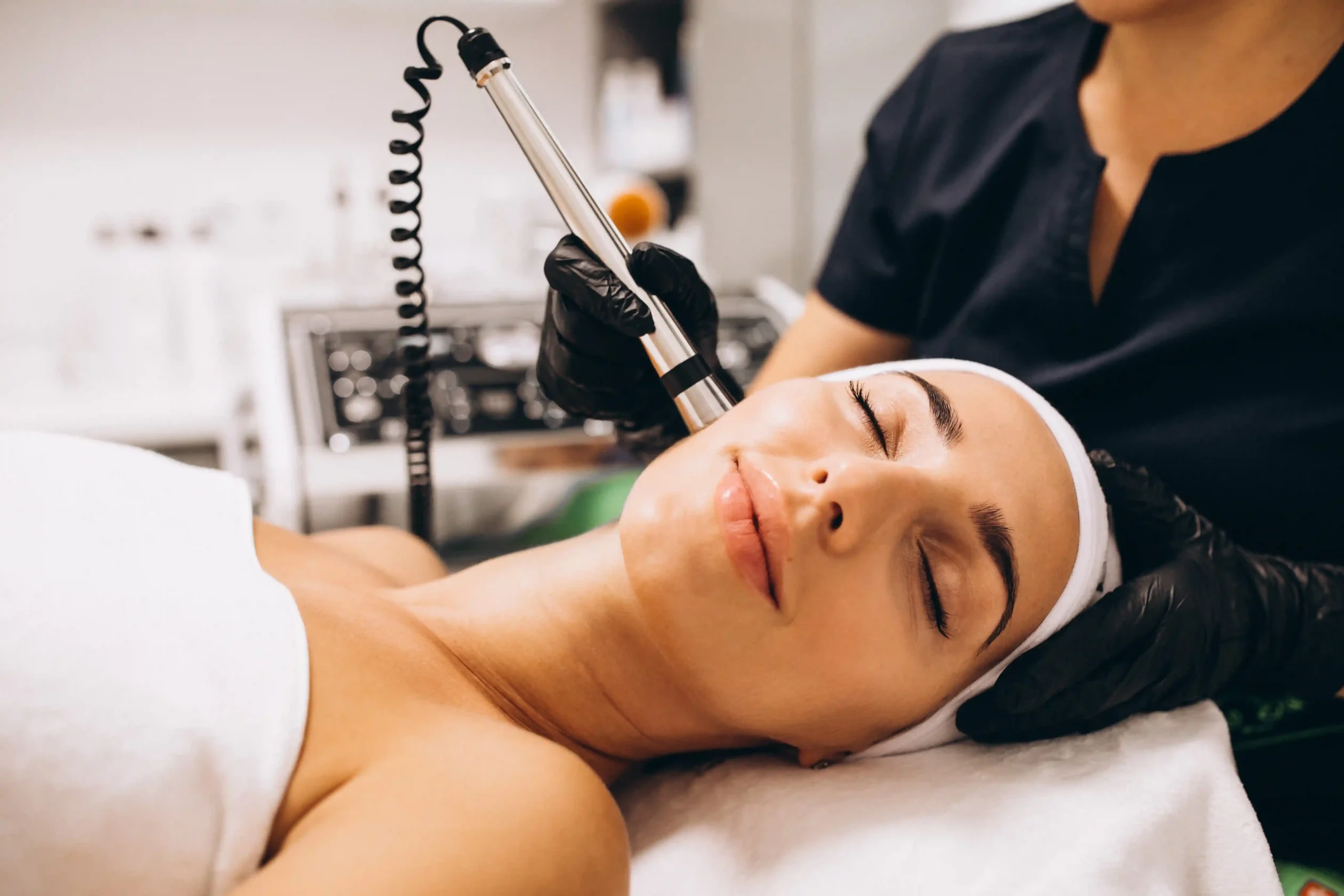 Woman receiving beauty treatment at medical spa for skin rejuvenation